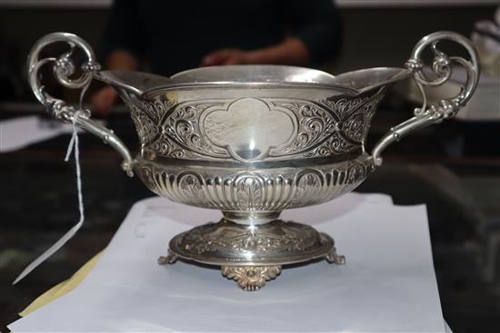 A late Victorian embossed silver two-handled shaped oval bowl, London, 1900, 18.5 oz.